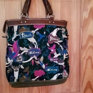 Sakroot multicolored fabric and leather trim tote.